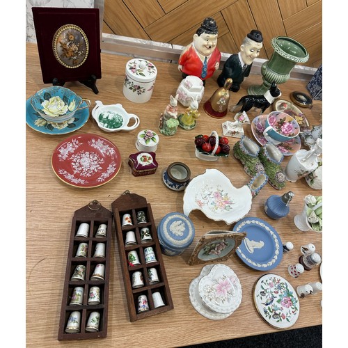 157 - Large selection of assorted pottery items to include figures, vases, trinkets etc