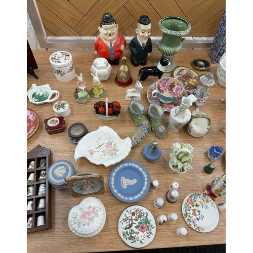 157 - Large selection of assorted pottery items to include figures, vases, trinkets etc