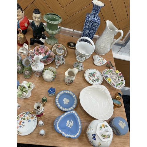 157 - Large selection of assorted pottery items to include figures, vases, trinkets etc