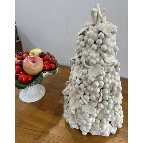 294 - Two large porcelain table centre pieces of fruit- tallest measures approx 18 inches tall