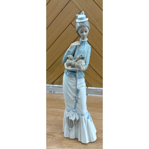 308 - Vintage Lladro Figurine: Lady With Dog & An Umbrella measures approx 14 inches tall