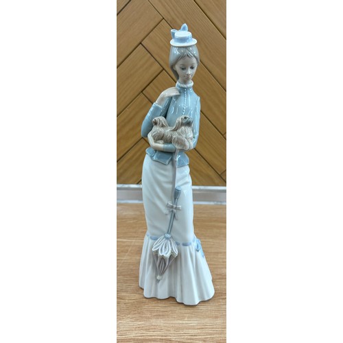 308 - Vintage Lladro Figurine: Lady With Dog & An Umbrella measures approx 14 inches tall