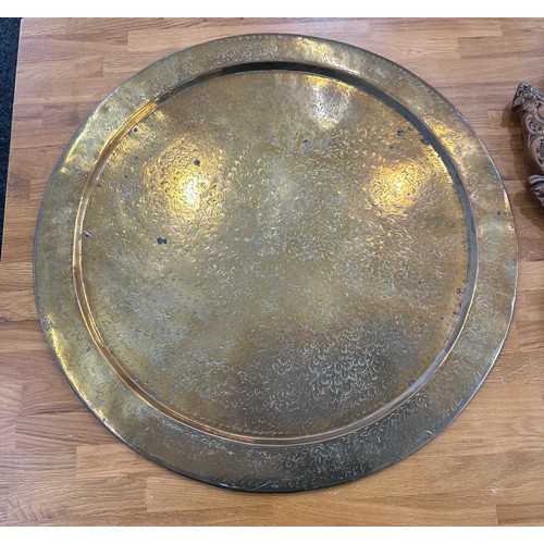 190 - Vintage gilt framed mirror and a brass charger- largest measures 23 inches diameter