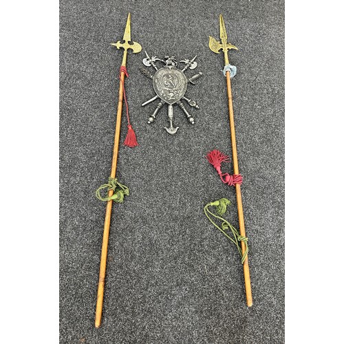 290 - Novelty brass and wooden pike sticks and a aluminium shield