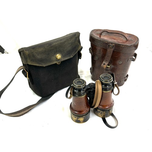 62 - L Petit Fabe Paris binoculars and case and a G Battle and co binocular case