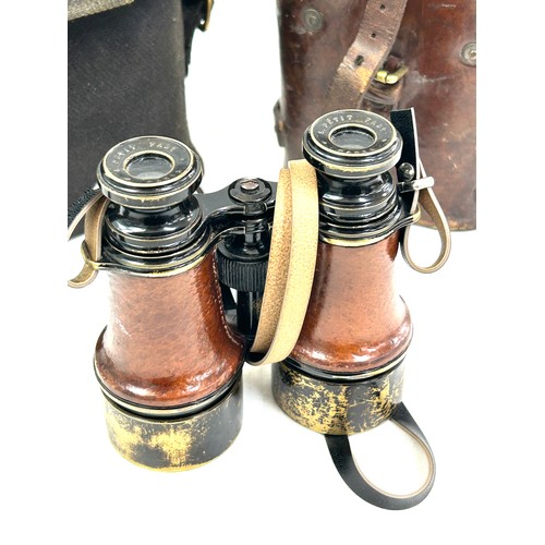 62 - L Petit Fabe Paris binoculars and case and a G Battle and co binocular case