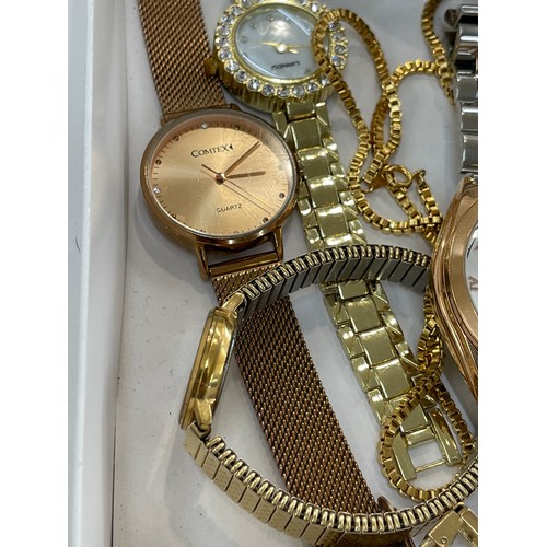 512 - Large selection of ladies wrist watches includes Comtex, Lige, Guess etc