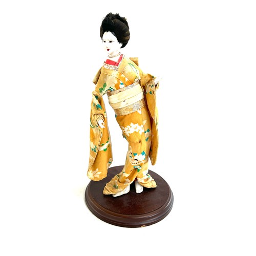 122 - Vintage hand painted geisha girl on stand measures approx 15 inches tall