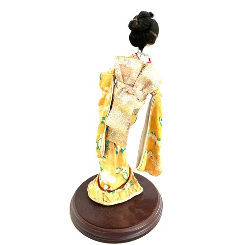 122 - Vintage hand painted geisha girl on stand measures approx 15 inches tall