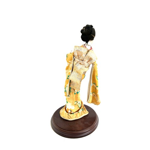 122 - Vintage hand painted geisha girl on stand measures approx 15 inches tall