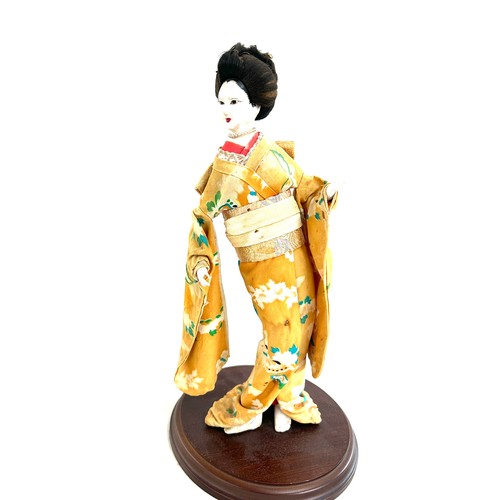 122 - Vintage hand painted geisha girl on stand measures approx 15 inches tall