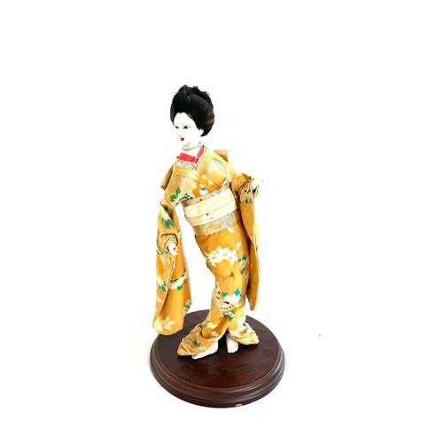 122 - Vintage hand painted geisha girl on stand measures approx 15 inches tall