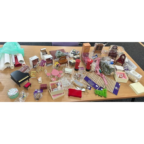 257 - Selection of vintage dolls house accessories to include furniture, garden items, wall paper etc