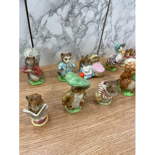 285 - Selection of 12 Beswick Beatrix potter figures includes Miss Moppet, Peter rabbit, Squirrel Nutkin, ... 