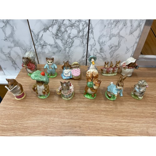 285 - Selection of 12 Beswick Beatrix potter figures includes Miss Moppet, Peter rabbit, Squirrel Nutkin, ... 