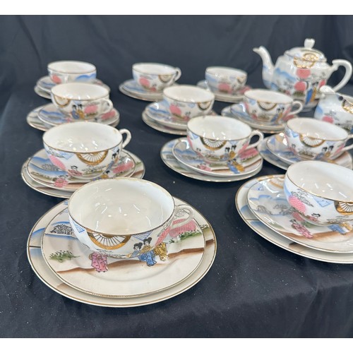 117 - Oriental hand painted tea service with marks to base to include 11 cups complete cups and saucers, t... 