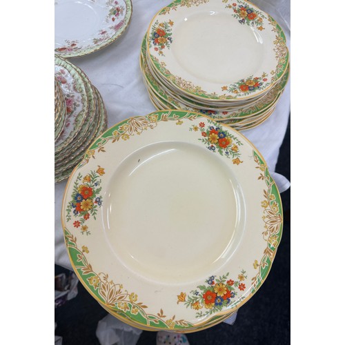 138 - Large selection of part dinner services to include Woods Ivory ware and others