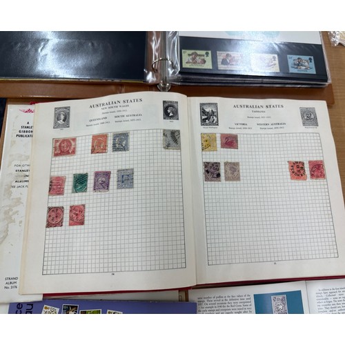 129 - Selection of assorted vintage and later stamps from various different countries in stamps albums and... 