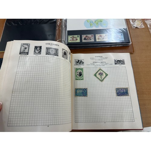 129 - Selection of assorted vintage and later stamps from various different countries in stamps albums and... 