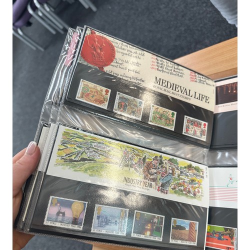 129 - Selection of assorted vintage and later stamps from various different countries in stamps albums and... 