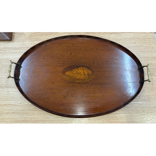 310 - Vintage wood and brass handled serving tray measures approx 14 inches long