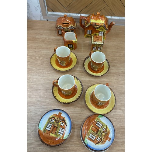 59 - Selection of ' Cottage ware' to include a tea pot, cups and saucers etc