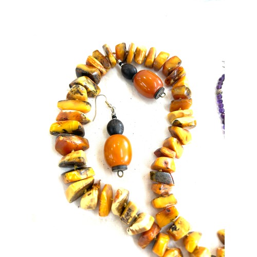 488 - Selection of assorted beads includes amber, turquoise etc