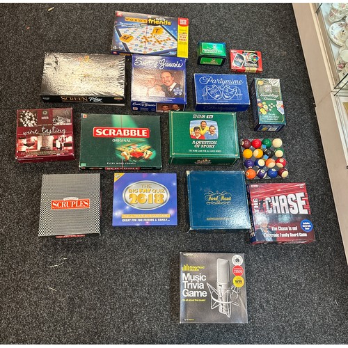 330 - Large selection of vintage and later games to include Trivial pursuit, scrabble, uno, The Chase and ... 