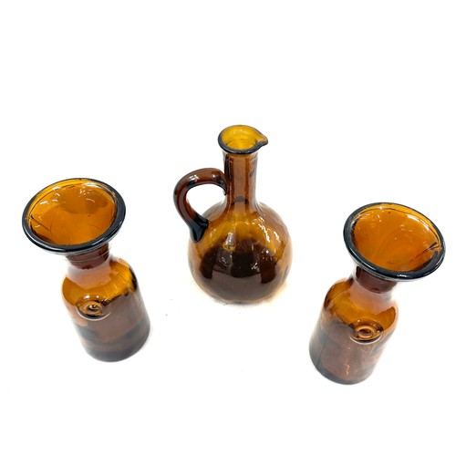 618 - Three Vintage hand blown amber coloured glass a pitcher and two others largest measures approx 9.5 i... 