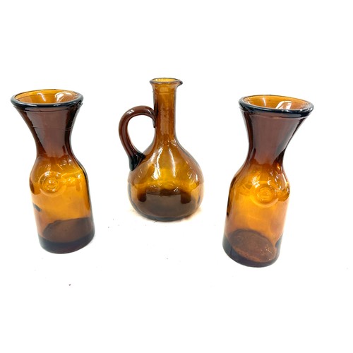 618 - Three Vintage hand blown amber coloured glass a pitcher and two others largest measures approx 9.5 i... 