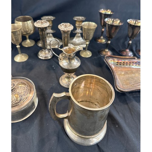 265 - Selection of silver plated ware to include tankard, candle sticks, decanter and stand etc