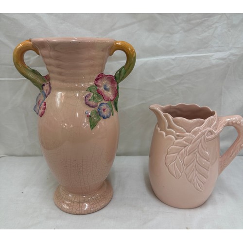 407 - Two pieces of Clarice Cliff a two handled painted vase and a jug largest measures approx 12 inches t... 