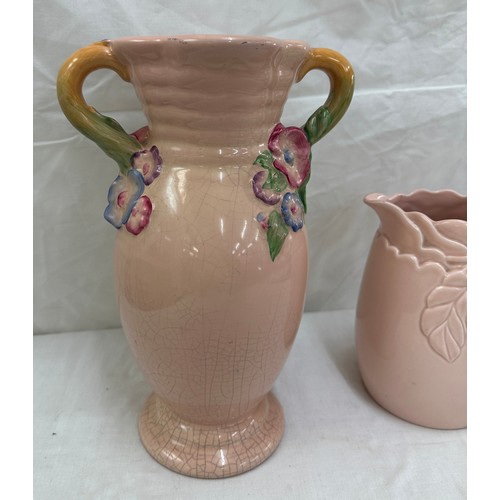 407 - Two pieces of Clarice Cliff a two handled painted vase and a jug largest measures approx 12 inches t... 