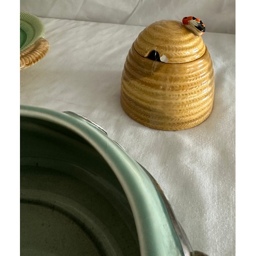 74 - Selection of Clarice Cliff items to include a honey pot, bowl and plate