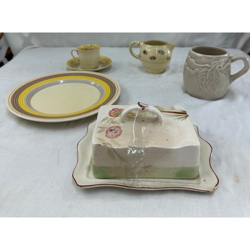 88 - Selection of Clarice Cliff items to include a matching cup and saucer, milk jug, plate etc and a Roy... 