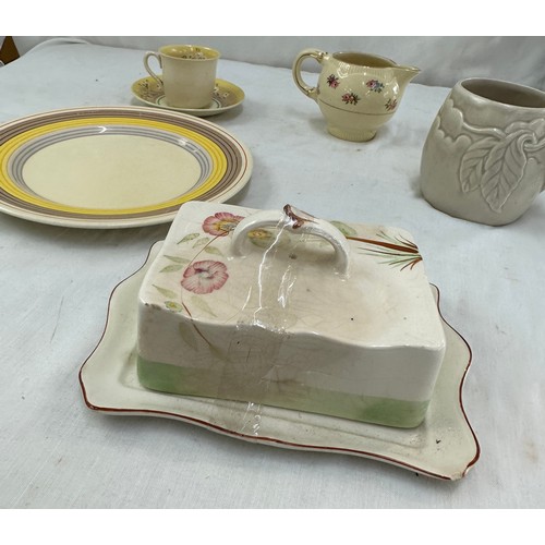 88 - Selection of Clarice Cliff items to include a matching cup and saucer, milk jug, plate etc and a Roy... 