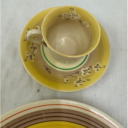 88 - Selection of Clarice Cliff items to include a matching cup and saucer, milk jug, plate etc and a Roy... 