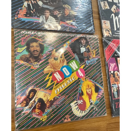 131 - Four original NOW thats what I call music vinyls to include numbers 1-4