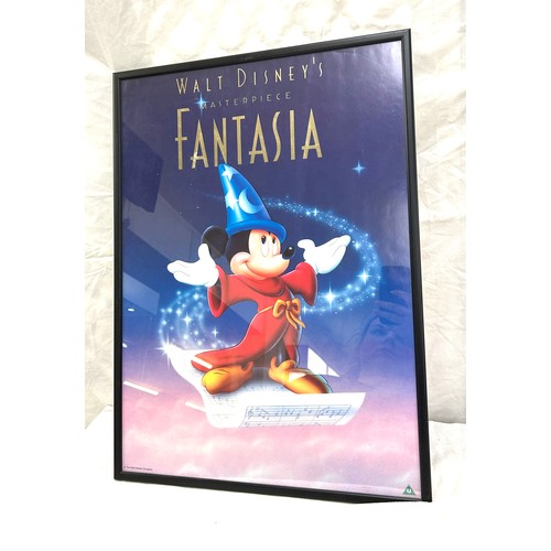 43 - Framed walt disney poster frame measures approximately 24 inches by 17.5 inches