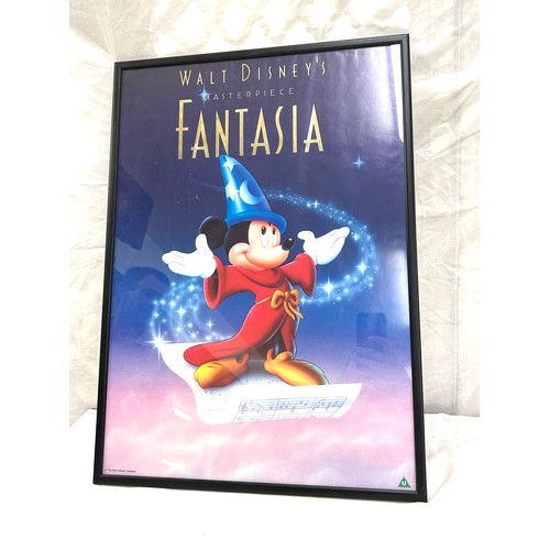 43 - Framed walt disney poster frame measures approximately 24 inches by 17.5 inches