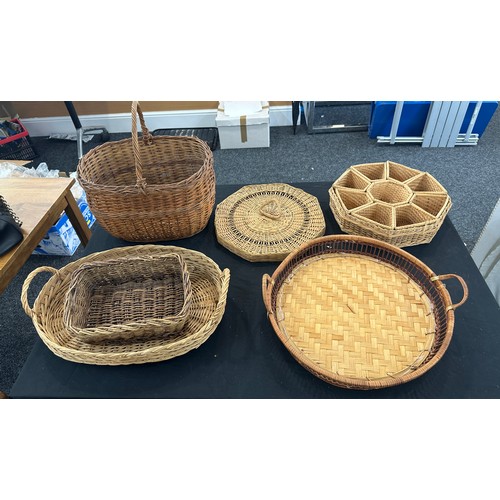 233 - Large selection of whicker baskets