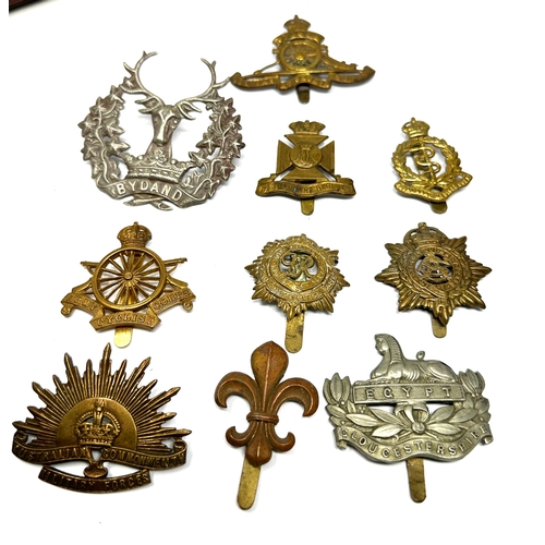 417 - 10 military cap badges