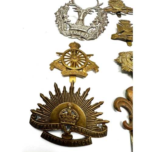 417 - 10 military cap badges