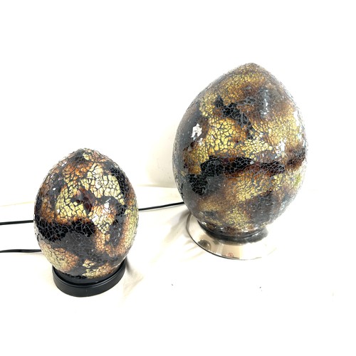 406 - Two modern egg lamps one large or small - largest measures approx 13 inches tall