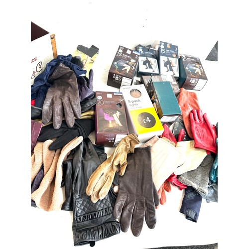 216 - Selection of vintage and later ladies tights and gloves in a storage box