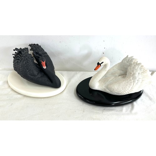 150 - Two swans on stands from The Franklin Mint collection to include 'The 1987 Franklin Mint The Black A... 