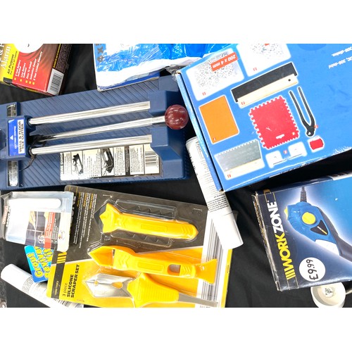 218 - Large selection of assorted tools/ diy equipment includes tile cutter, Work Zone, Power fix etc