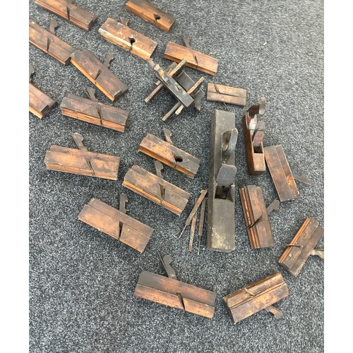 180 - Large box of antique wooden moulding planes and other wood working tools