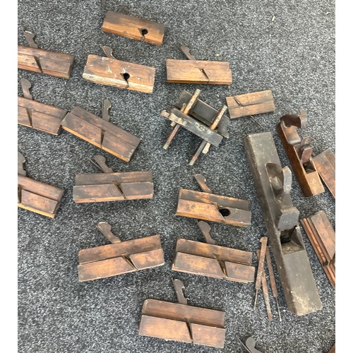 180 - Large box of antique wooden moulding planes and other wood working tools