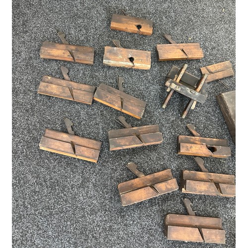 180 - Large box of antique wooden moulding planes and other wood working tools